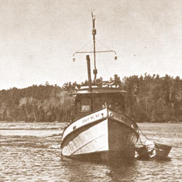 Tug Boat and Log Boom